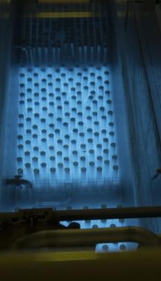Blue glow from cesium and strontium capsules stored underwater at WESF. 